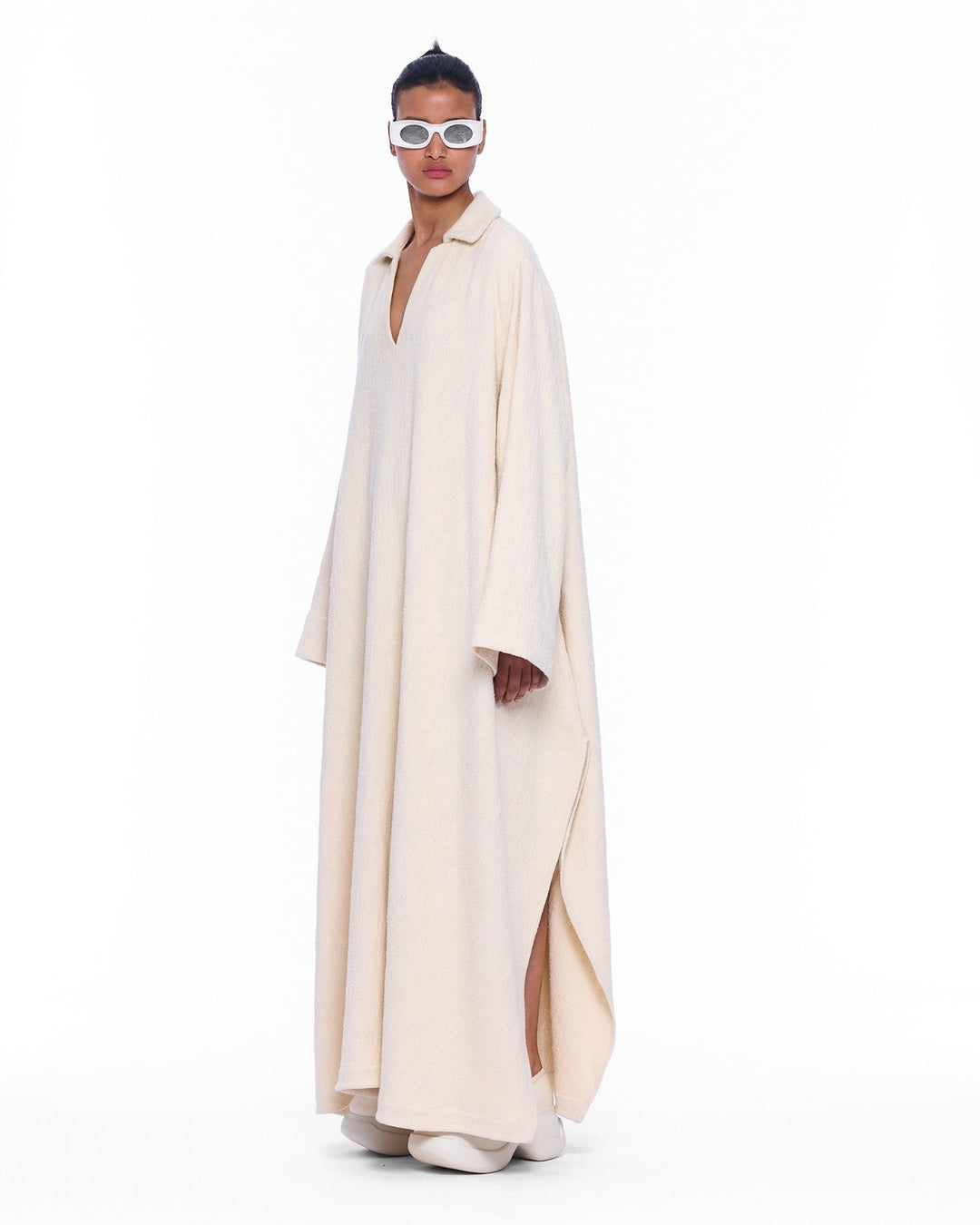 V-Neck Ecru Caftan by Marrakshi Life, handcrafted in Marrakesh with a soft ecru tone, flowing silhouette, wide sleeves and a clean V-neckline.