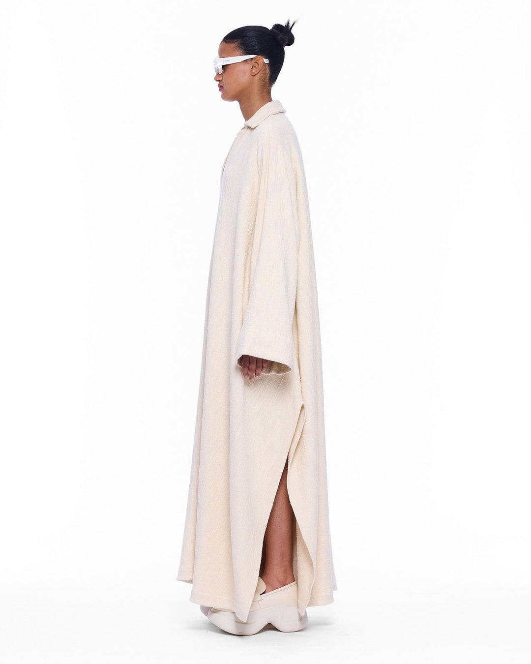 V-Neck Ecru Caftan by Marrakshi Life, handcrafted in Marrakesh with a soft ecru tone, flowing silhouette, wide sleeves and a clean V-neckline.v