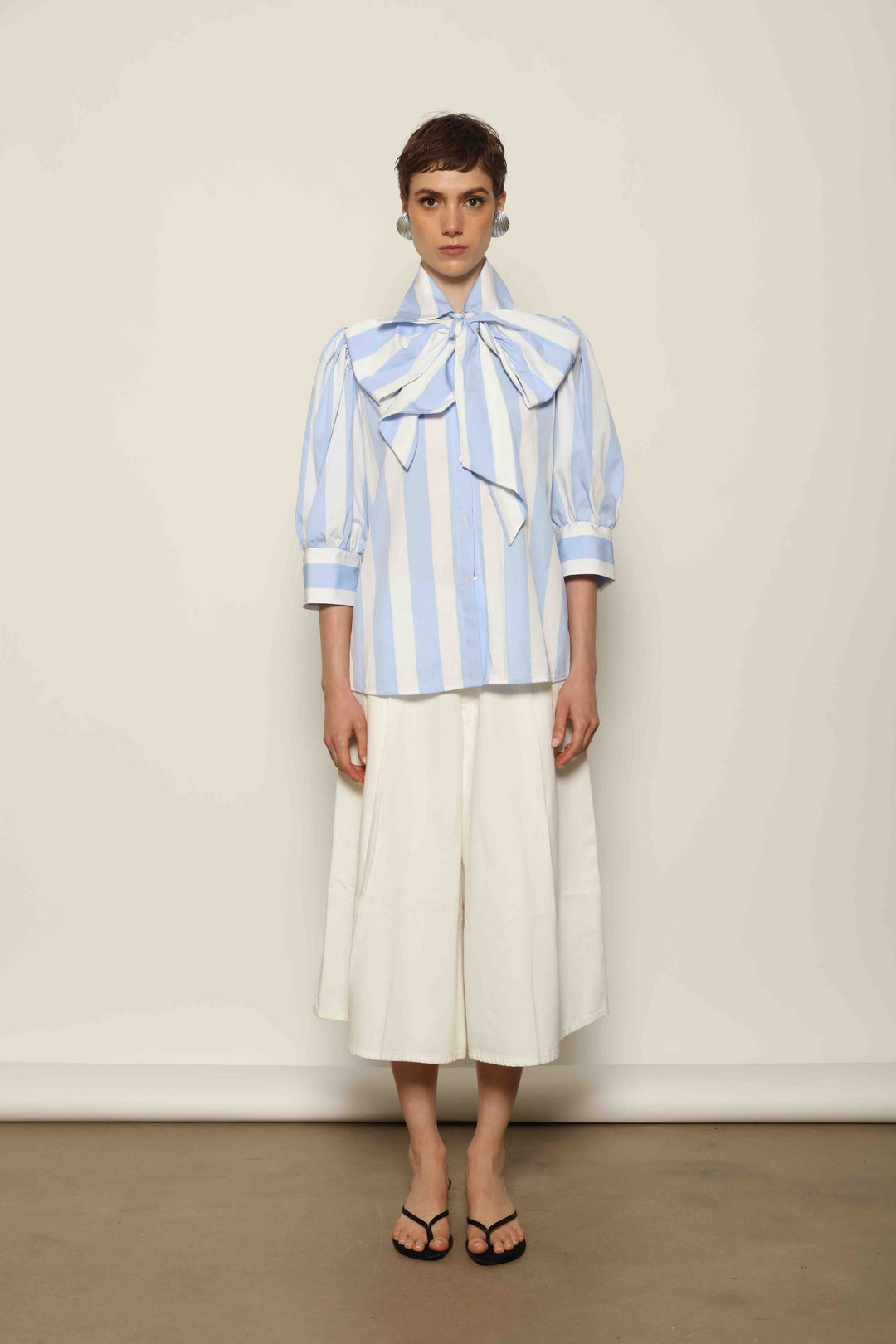 La Jupe Culotte in Blanc Cassè by HAPPY HAUS, crafted from premium Japanese denim with a high waist and wide-leg silhouette.