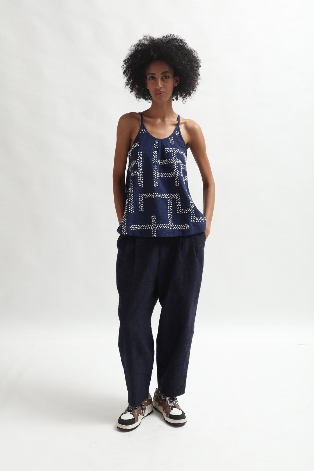 Indigo embroidered top by Paiwand made from organic indigo-dyed cotton with upcycled embroidery, ethically handcrafted in India.