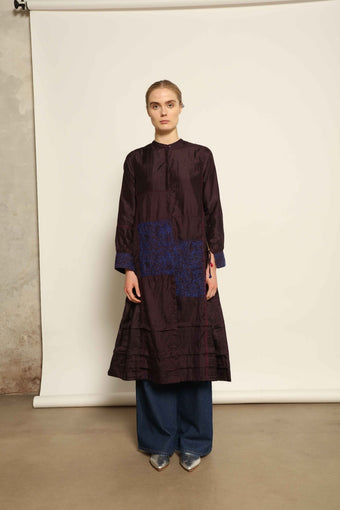 Model wearing the Miraj 121 Dress by Injiri, crafted from maroon pure silk with intricate navy blue hand embroidery, curated by House of Nomad Stories.