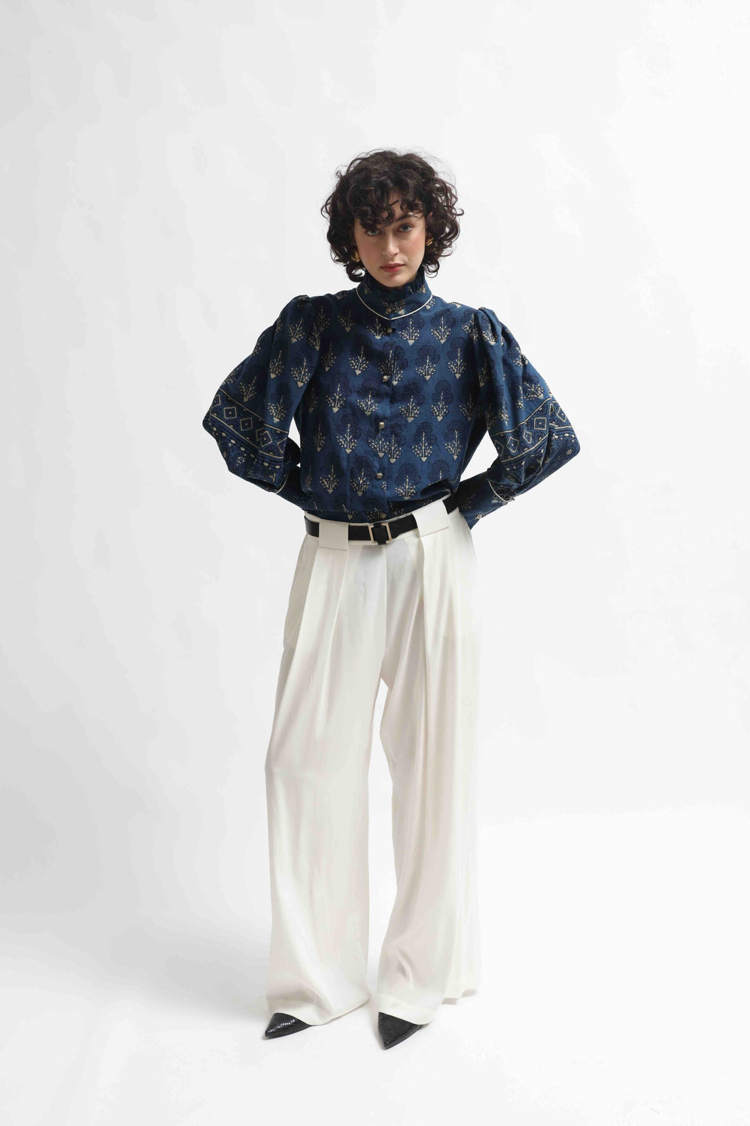 Karin blouse made from 100% organic cotton with Ajrakh blockprint in natural indigo blue, featuring volant detail, handcrafted by House of Nomad Stories.