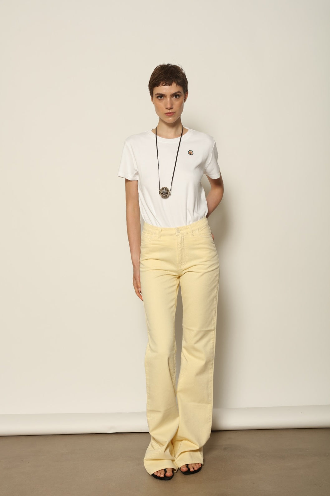 Le Pantalon Tulipe in Banana by HAPPY HAUS with a softly flared leg and relaxed regular length.