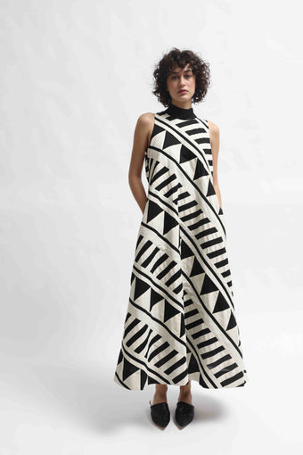 Lino Dress by Ka-Sha – handcrafted A-line cotton dress with black and white appliqué detailing, 46" length, and a relaxed, elegant silhouette. Part of the House of Woven Stories selection.