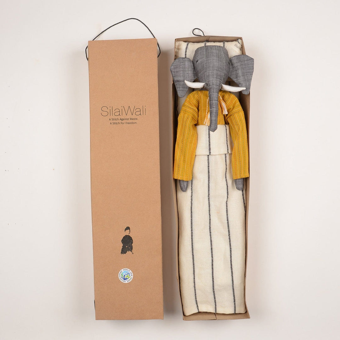 Handcrafted elephant cloth doll named Mumba by SilaiWali, made from upcycled fabric, featuring eco-friendly design. Available at House of Nomad Stories