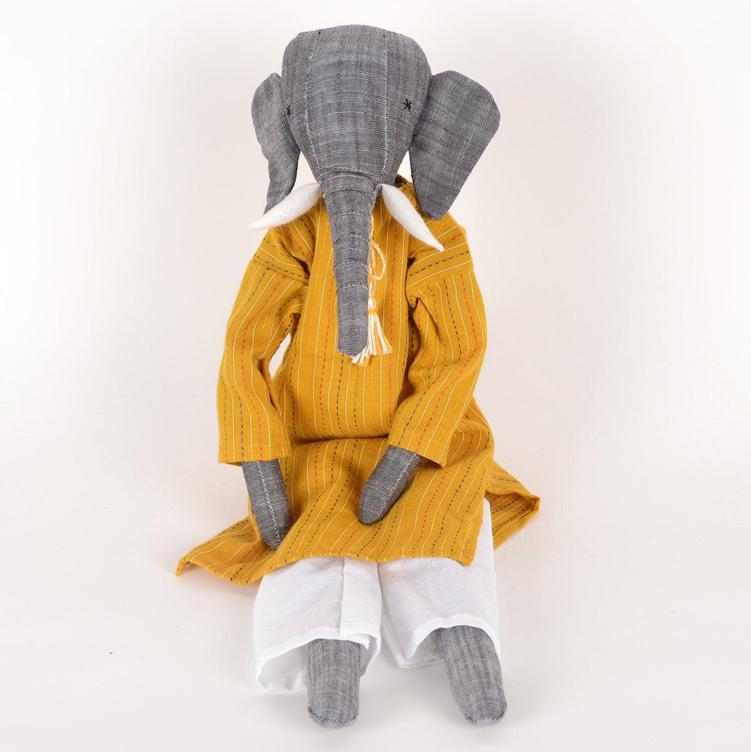 Handcrafted elephant cloth doll named Mumba by SilaiWali, made from upcycled fabric, featuring eco-friendly design. Available at House of Nomad Stories