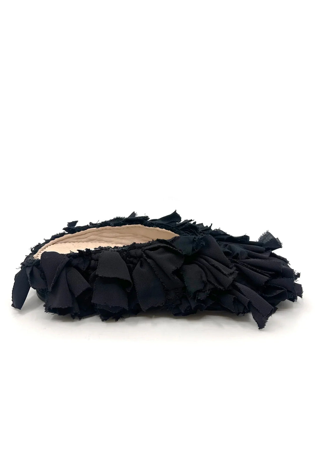 Aili Black Mono Babouches by Calla, entirely black handmade Moroccan slippers from upcycled Berber rugs, available at House of Nomad Stories