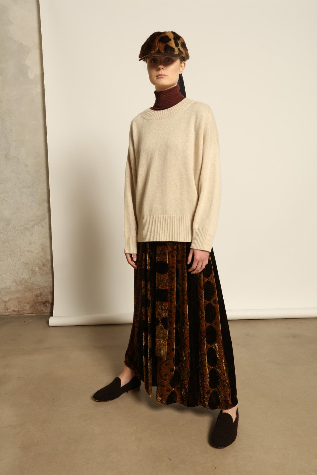 Model is wearing the Ambra Mauri Skirt by Obidi, made from premium flowing fabric with a flattering silhouette, combining contemporary design with traditional craftsmanship.