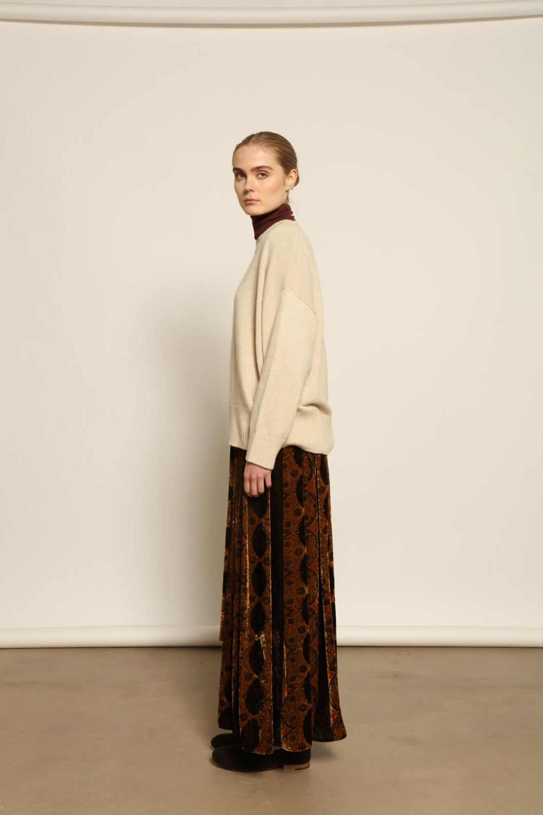 Model is wearing the Ambra Mauri Skirt by Obidi, made from premium flowing fabric with a flattering silhouette, combining contemporary design with traditional craftsmanship.