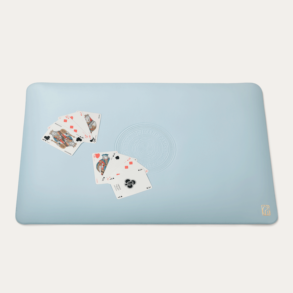Apple Leather Playing Mat by Grimaud Paris from the House of Nomad Stories selection, crafted in Dolphin Blue apple leather, designed in France as a luxury card game mat for refined play, shuffle, and leisure moments.