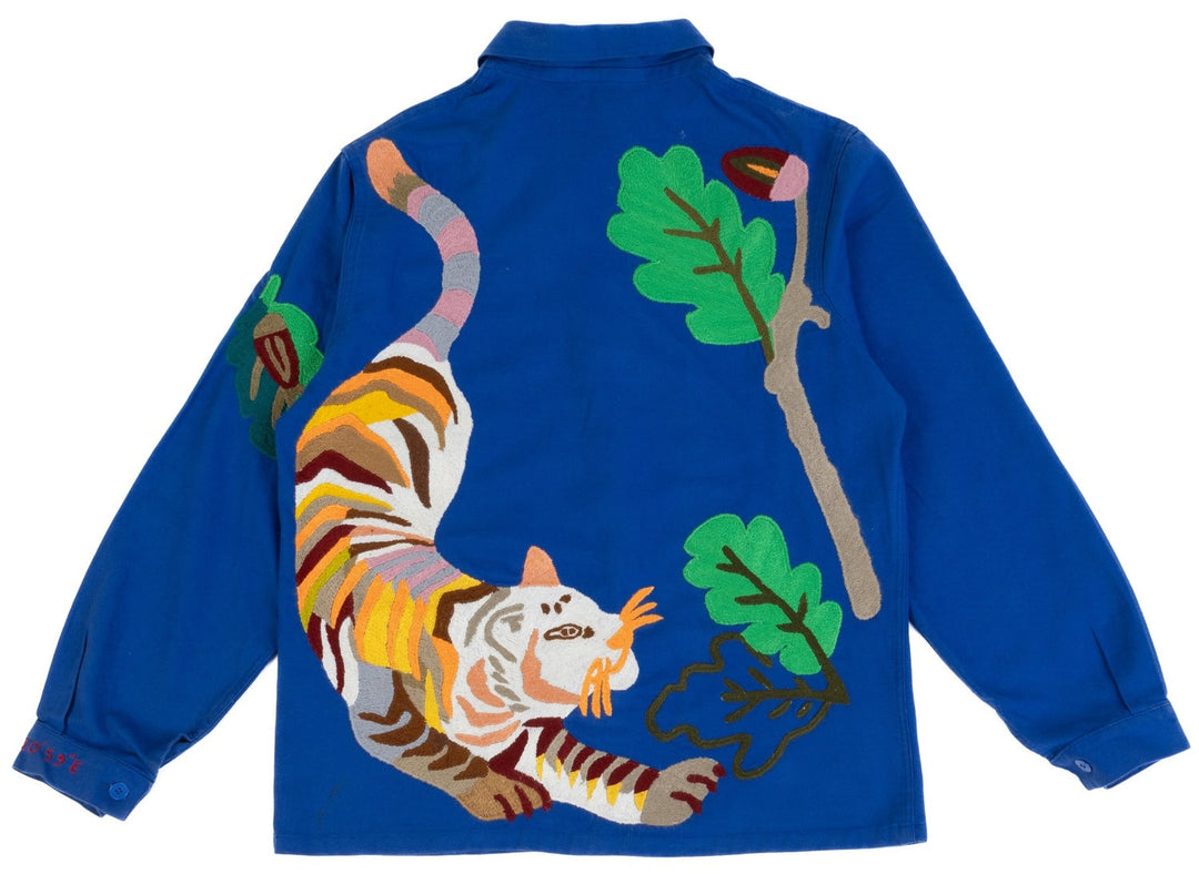 Bleu de Travail vintage French workwear jacket by Kilometre Paris, hand-embroidered with birds and flowers, part of the House of Nomad Stories selection.