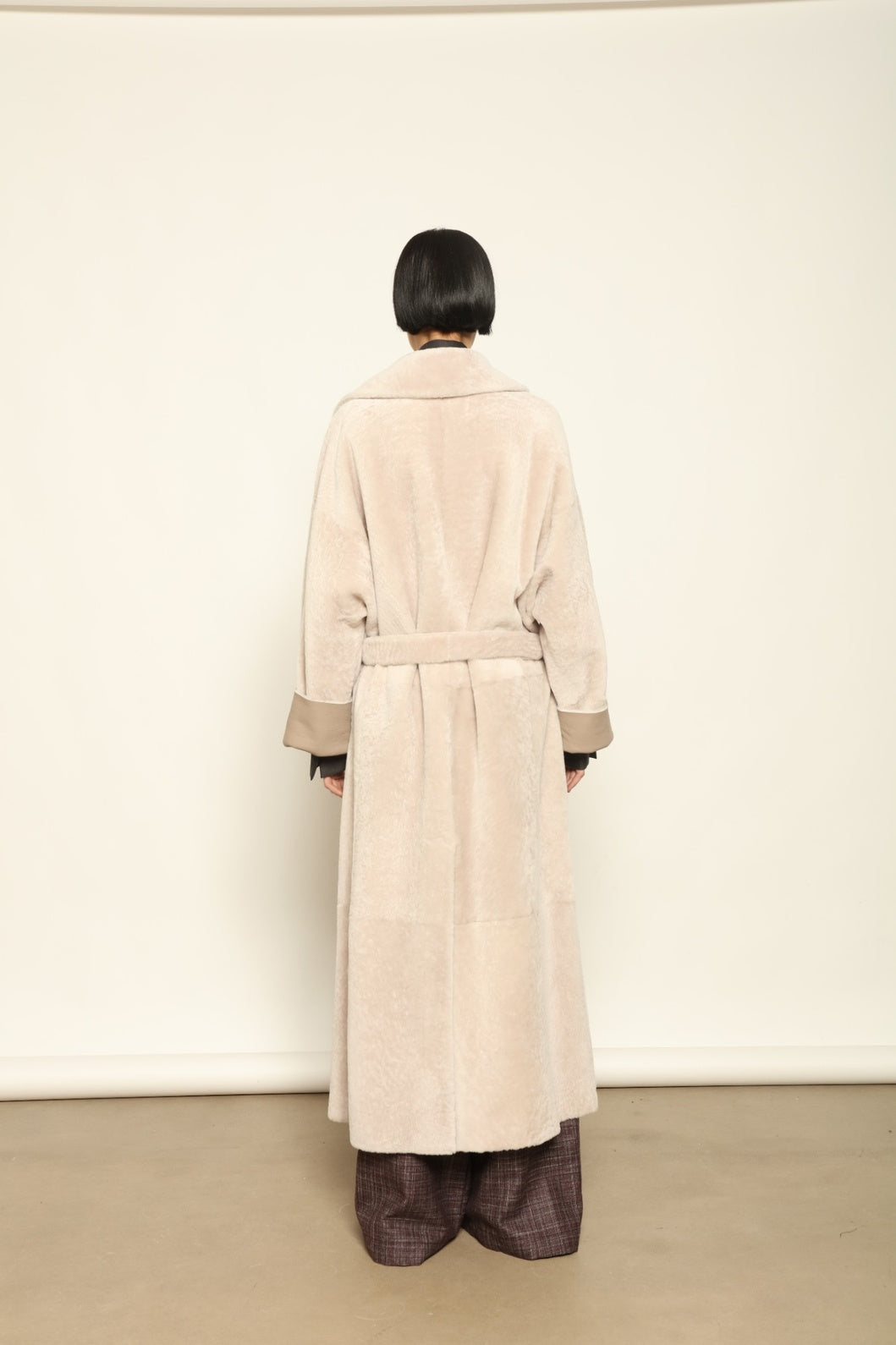 Charlotte Grey Sud Africa Astracan Nappa Coat by Novelle – reversible Italian shearling and leather coat in natural greige tone, handcrafted from astrakhan nappa and wool for timeless elegance and sustainable luxury at House of Woven Stories.