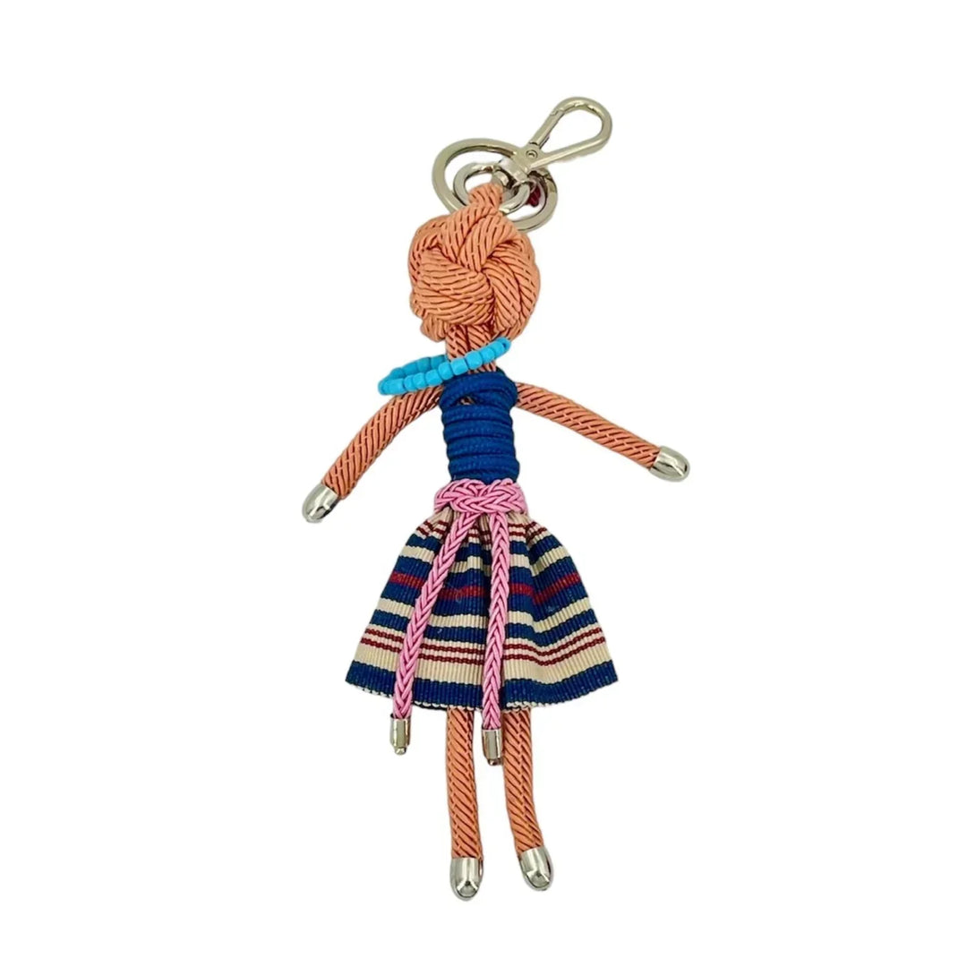 Chloe Keyring by MY BOB, handmade in Italy by skilled artisans. A 70s-inspired macramé accessory, 20 cm long, adding vibrant style and personality to bags or keys. Part of a collection celebrating global traditions and craftsmanship, each keyring comes in a soft cotton pouch.