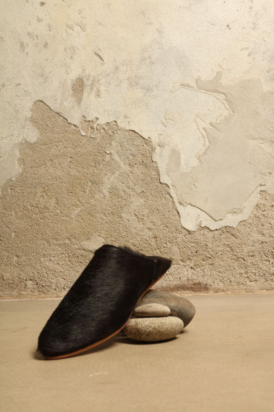 Cowhide Black Baboush by House of Nomad Stories, handmade in Marrakesh from soft black cowhide with supple leather construction and a refined unisex silhouette.