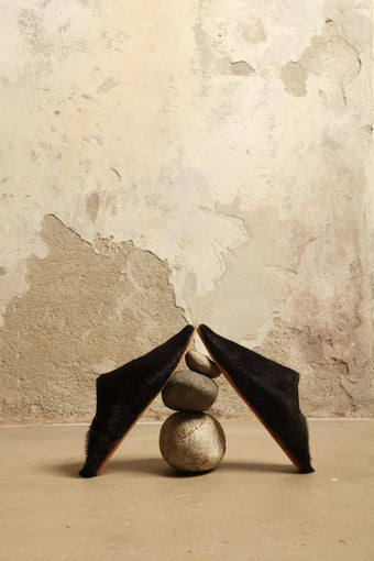 Cowhide Black Baboush by House of Nomad Stories, handmade in Marrakesh from soft black cowhide with supple leather construction and a refined unisex silhouette.