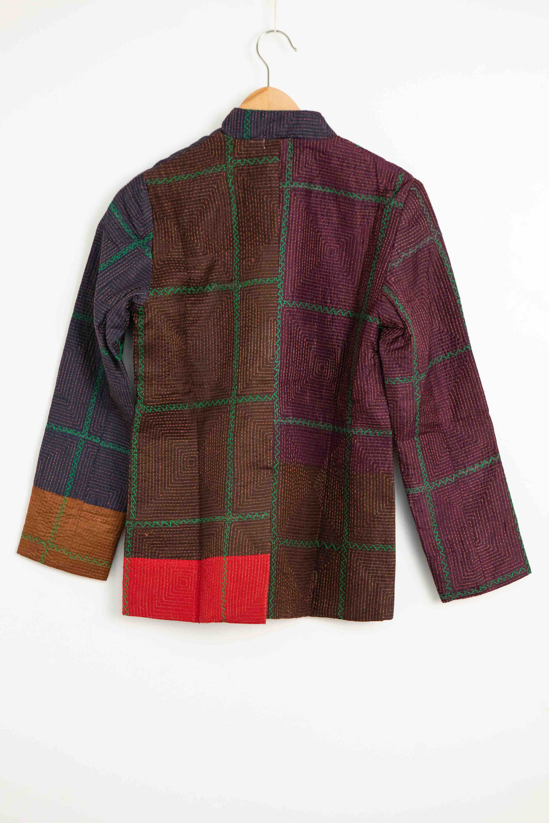 Model is wearing the Folklore 82 silk hand-loomed jacket by Injiri, featuring lightweight silk, refined tailoring, and artisanal craftsmanship, handmade in India. 