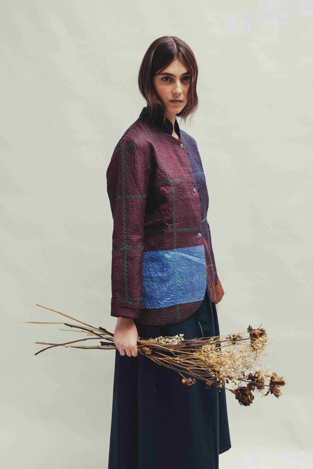 Model is wearing the Folklore 82 silk hand-loomed jacket by Injiri, featuring lightweight silk, refined tailoring, and artisanal craftsmanship, handmade in India. 