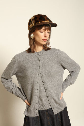 Model wearing the Graphite Nathalie Cashmere Cardigan by House of Nomad Stories, made from 100% pure Inner Mongolia cashmere, featuring a deep graphite grey tone, soft breathable texture, open-front silhouette, and sustainable luxury craftsmanship