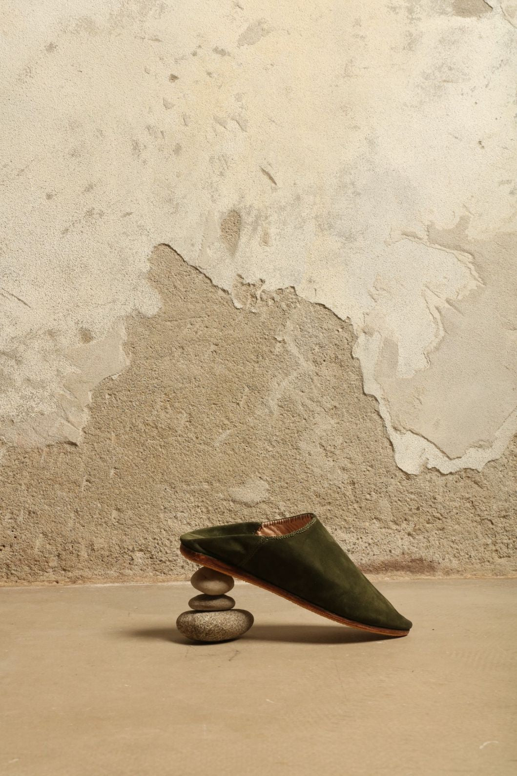 Green Taupe Suede Baboush by House of Nomad Stories, handmade in Marrakesh from soft suede leather with a cushioned sole and understated earthy green taupe finish.