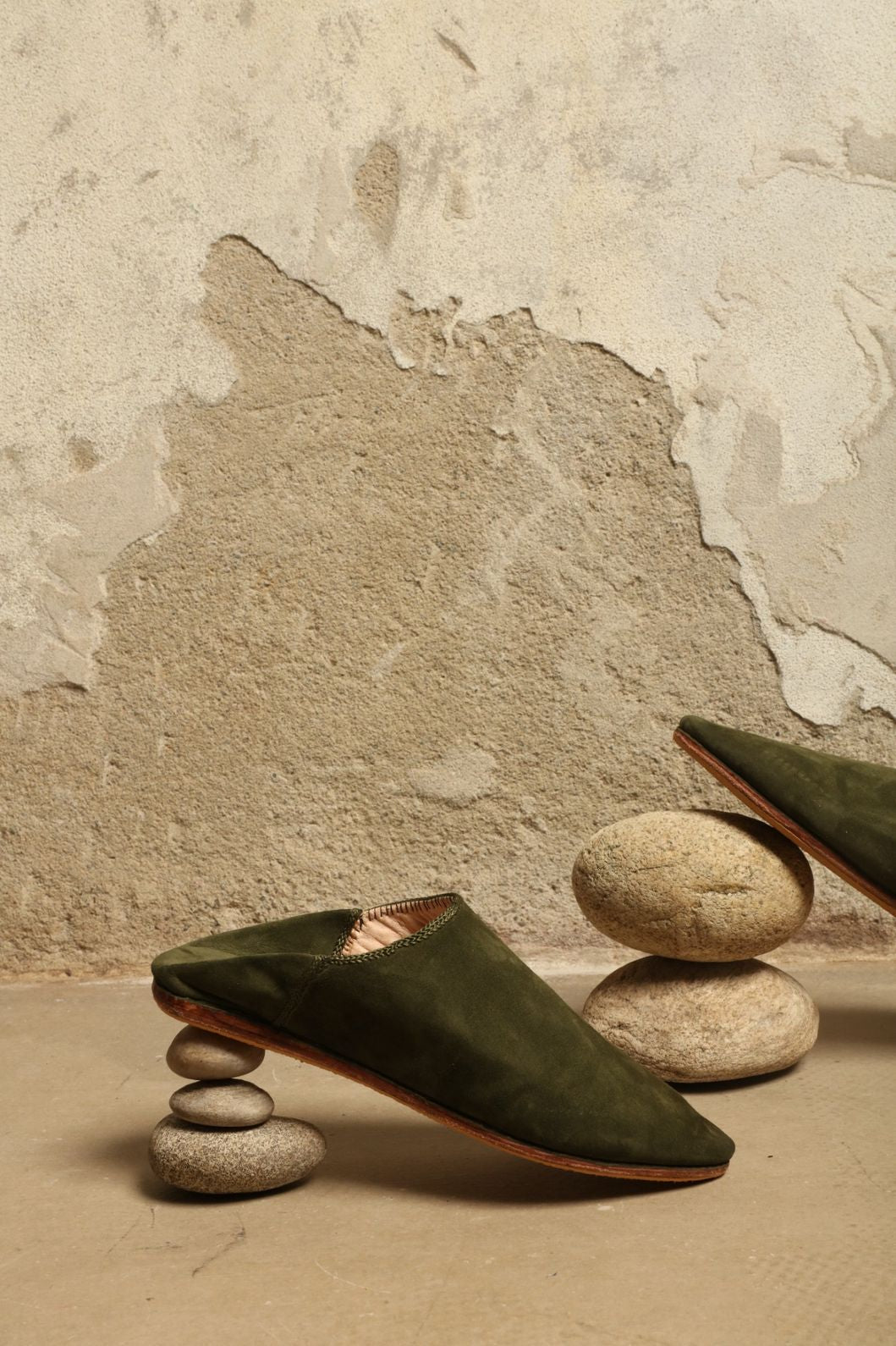 Green Taupe Suede Baboush by House of Nomad Stories, handmade in Marrakesh from soft suede leather with a cushioned sole and understated earthy green taupe finish.