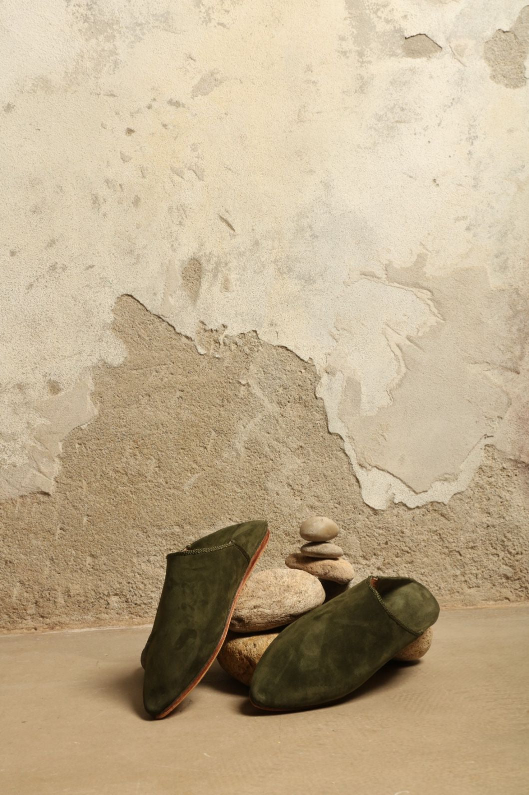 Green Taupe Suede Baboush by House of Nomad Stories, handmade in Marrakesh from soft suede leather with a cushioned sole and understated earthy green taupe finish.