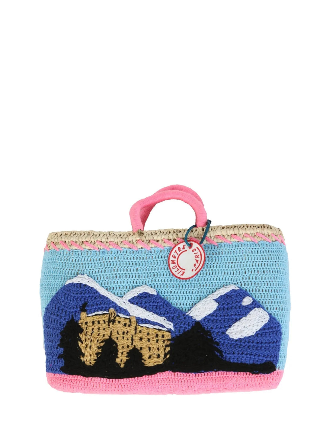 Diamond & Rolls Undercover basket bag by Kilometre Paris, curated by House of Nomad Stories, featuring pink crochet, blue Gstaad lettering and vintage car embroidery on handwoven straw, inspired by winter glamour and travel