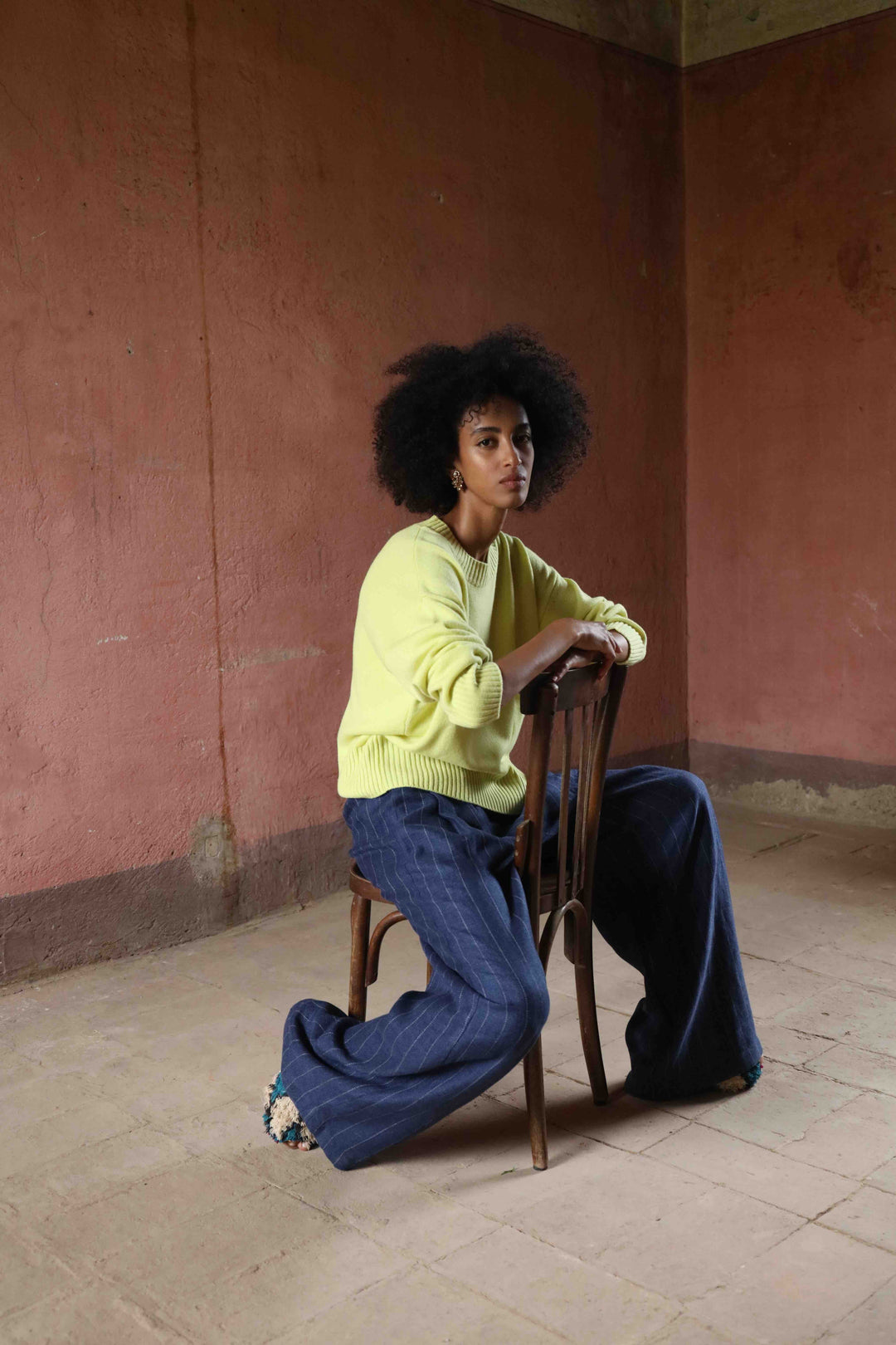Nena Round Neck Sweater by House of Nomad Stories 100% pure, undyed Inner Mongolian cashmere. Soft, breathable, handcrafted in natural tones. Relaxed fit with ribbed trims. Sustainable luxury knitwear.