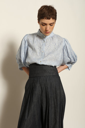 Model wearing the Sergey Night Blue Cummerbund by House of Nomad Stories, featuring a structured silk-wool blend, deep night blue tone, and sculptural waist-defining silhouette.