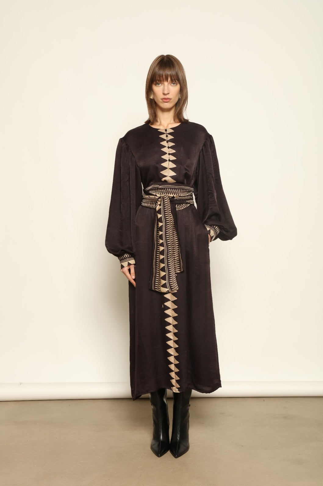 Model is wearing the Ibiza Silk Dress with Belt by House of Nomad Stories, made from Seta Mulberry silk with hand-printed Ajrakh patterns, styled with two silk belts for a versatile silhouette.