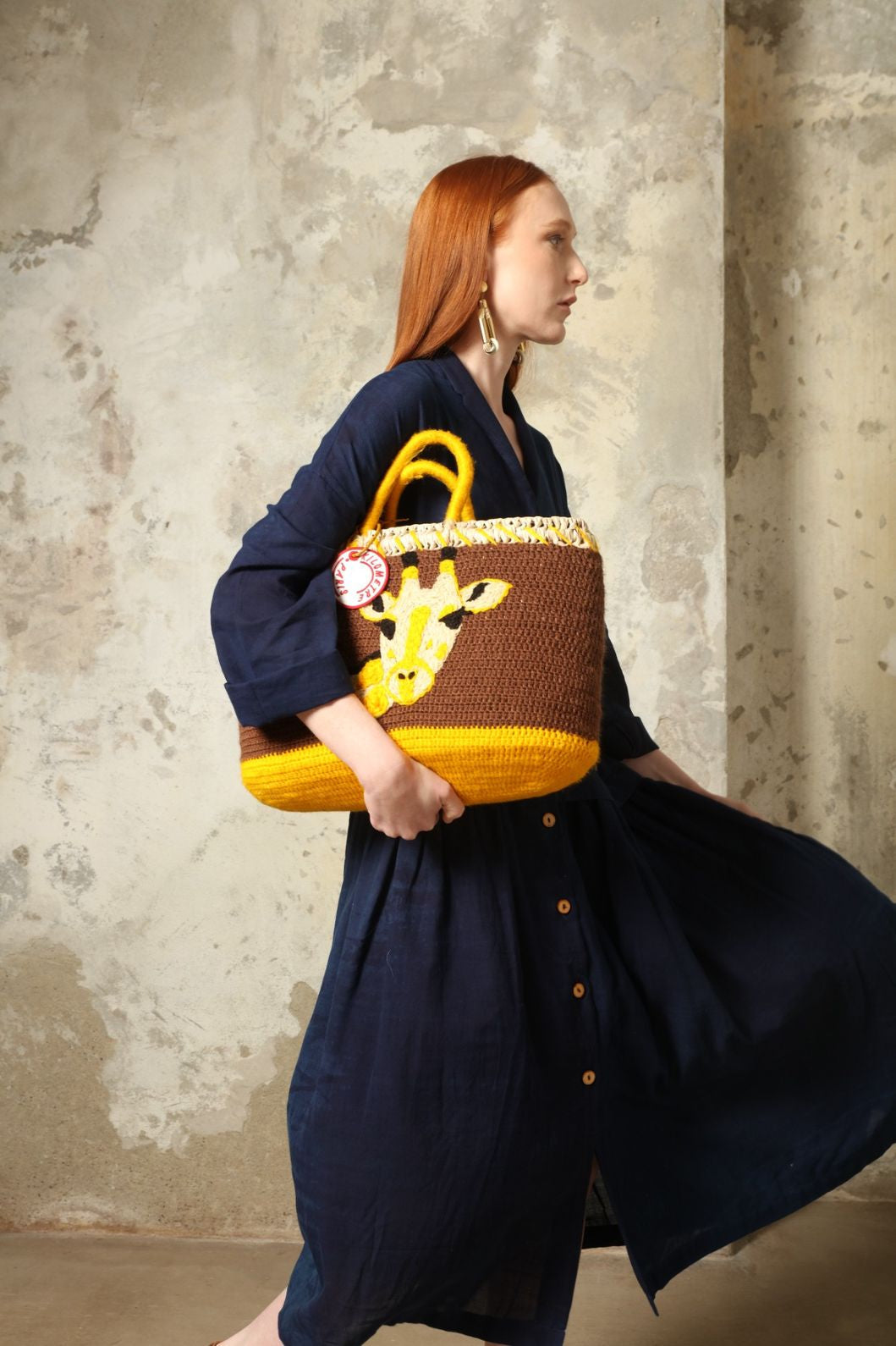 Indigo Marie Dress by House of Nomad Stories, crafted from 100% cotton and hand-dyed with natural indigo in India, featuring a fluid silhouette and unique variations created by the artisanal dyeing process.