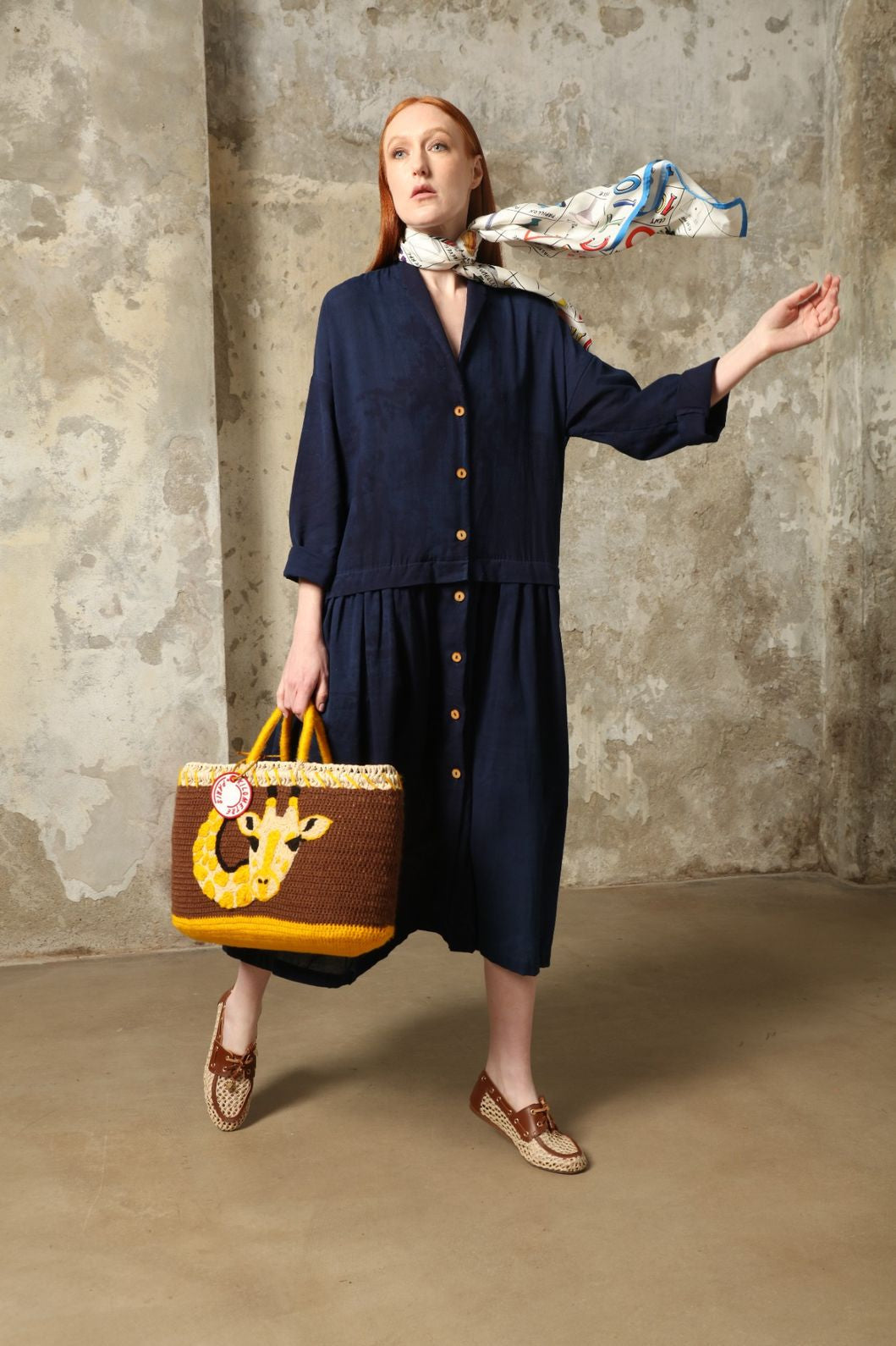 Indigo Marie Dress by House of Nomad Stories, crafted from 100% cotton and hand-dyed with natural indigo in India, featuring a fluid silhouette and unique variations created by the artisanal dyeing process.