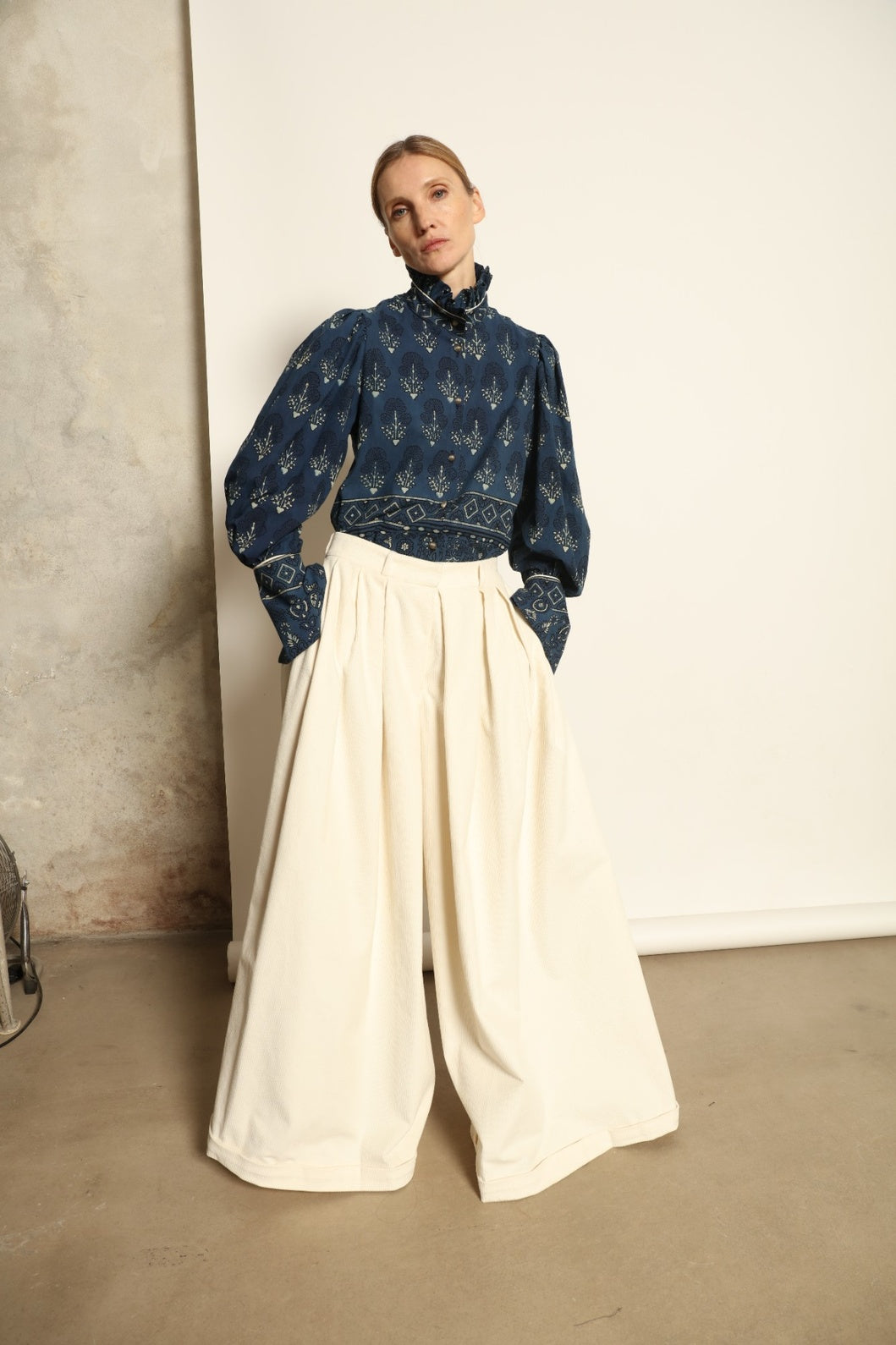 Karin Pure Organic Cotton Blouse with Volant by House of Nomad Stories, made in Italy from 100% organic cotton with traditional Ajrakh block printing, natural indigo dye, black and white accents, and a feminine volant detail.
