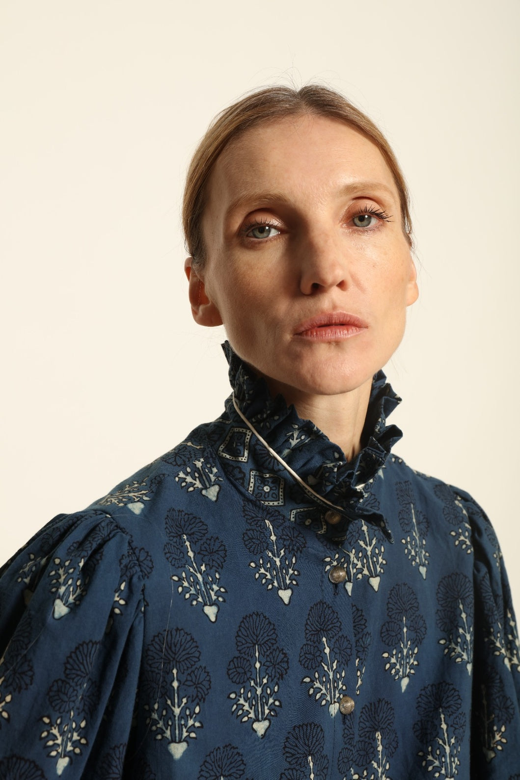 Karin Pure Organic Cotton Blouse with Volant by House of Nomad Stories, made in Italy from 100% organic cotton with traditional Ajrakh block printing, natural indigo dye, black and white accents, and a feminine volant detail.