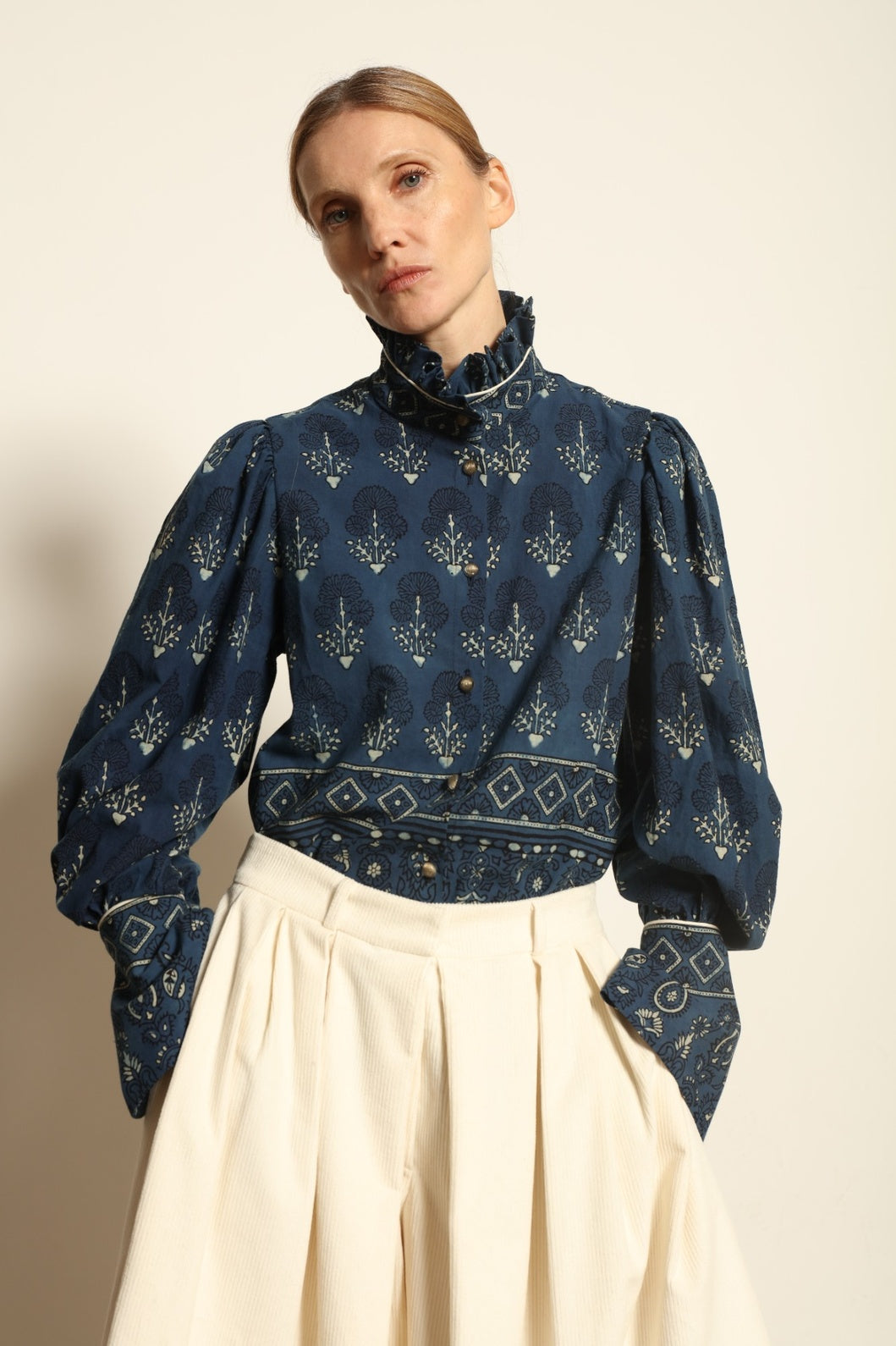 Karin Pure Organic Cotton Blouse with Volant by House of Nomad Stories, made in Italy from 100% organic cotton with traditional Ajrakh block printing, natural indigo dye, black and white accents, and a feminine volant detail.