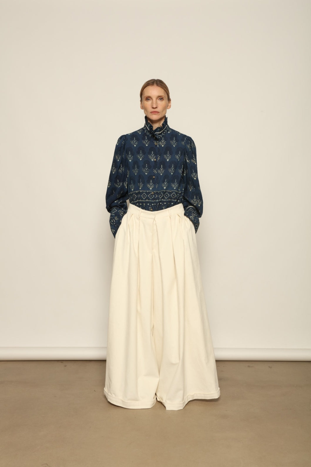 Karin Pure Organic Cotton Blouse with Volant by House of Nomad Stories, made in Italy from 100% organic cotton with traditional Ajrakh block printing, natural indigo dye, black and white accents, and a feminine volant detail.