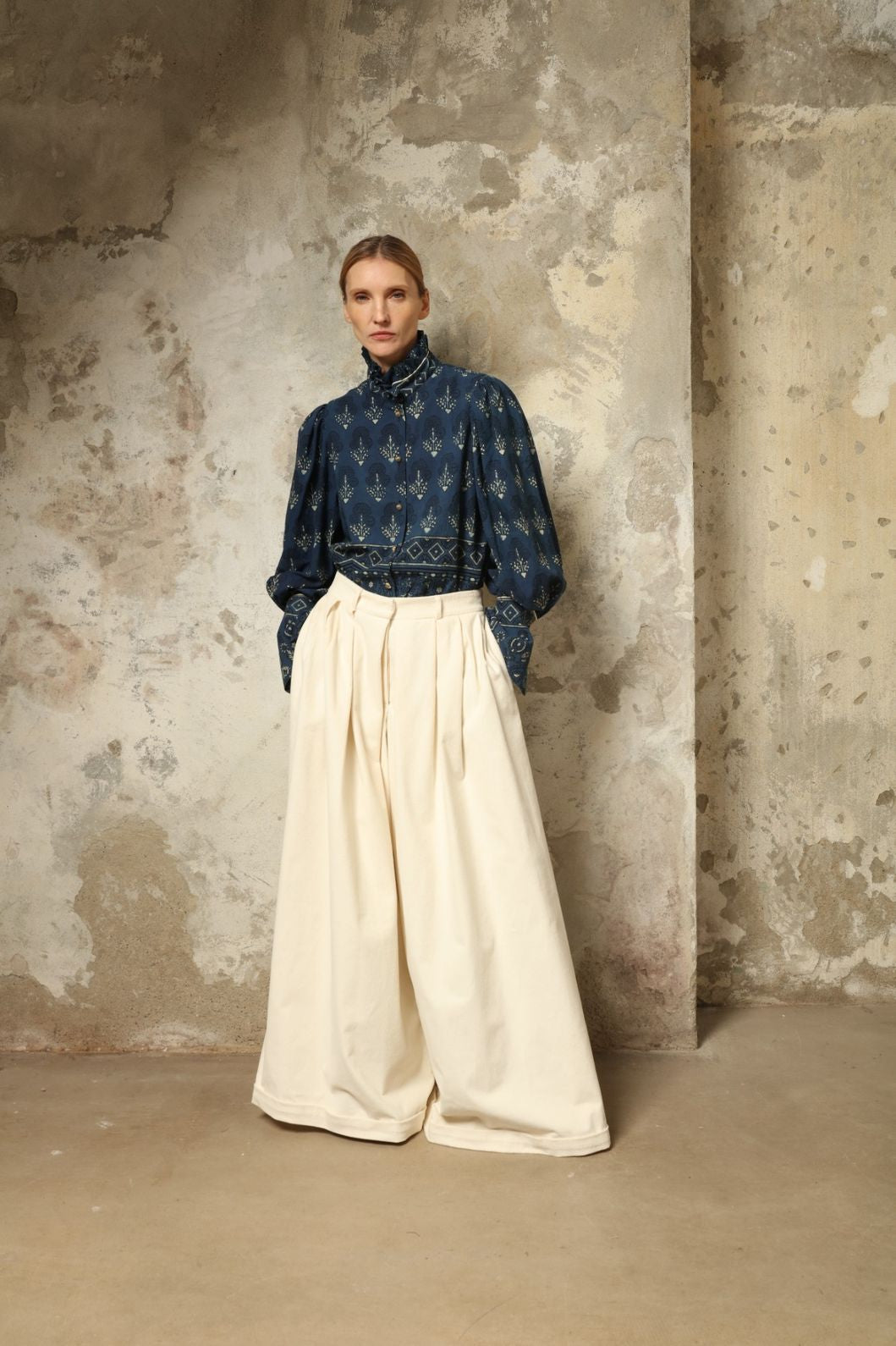 Karin Pure Organic Cotton Blouse with Volant by House of Nomad Stories, made in Italy from 100% organic cotton with traditional Ajrakh block printing, natural indigo dye, black and white accents, and a feminine volant detail.