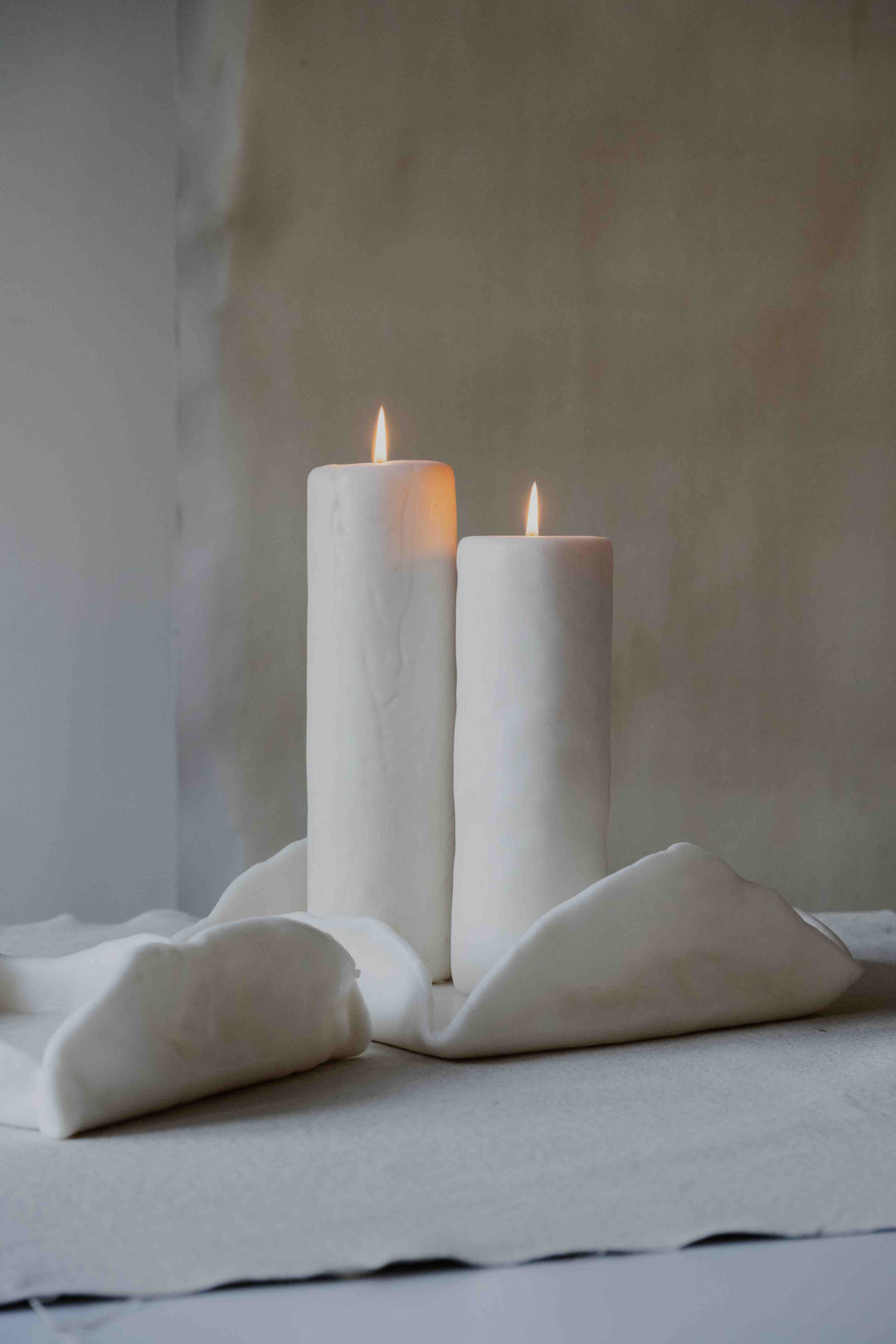 KLOTZ 1-Wick Round High beeswax candle by Oberflacht, part of the House of Nomad Stories selection, handmade in the Black Forest with tall cylindrical form and unique variations in colour and texture.