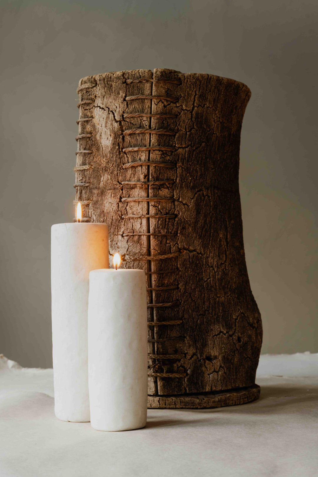 KLOTZ 1-Wick Round High beeswax candle by Oberflacht, part of the House of Nomad Stories selection, handmade in the Black Forest with tall cylindrical form and unique variations in colour and texture.