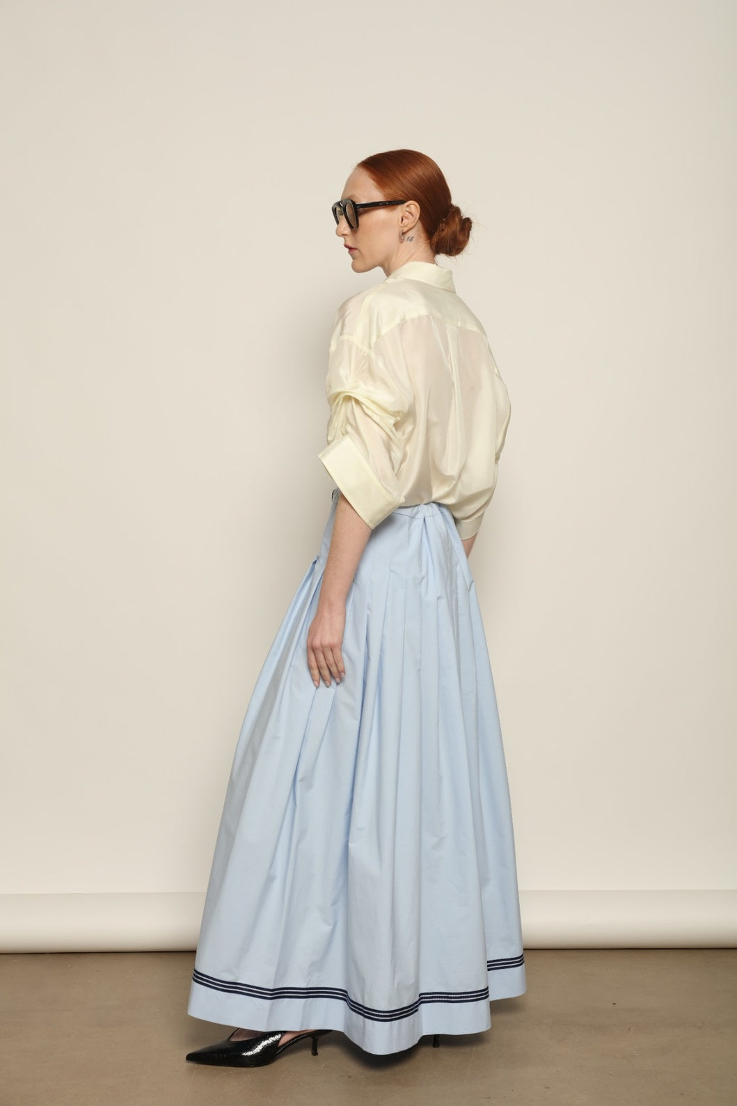 Buba Shirt by Maison Jejia in fluid silk, featuring a softly draped silhouette, delicate ruffle detailing at the sleeves and a light, airy finish, available in Pink and Vanilla and made in Italy.
