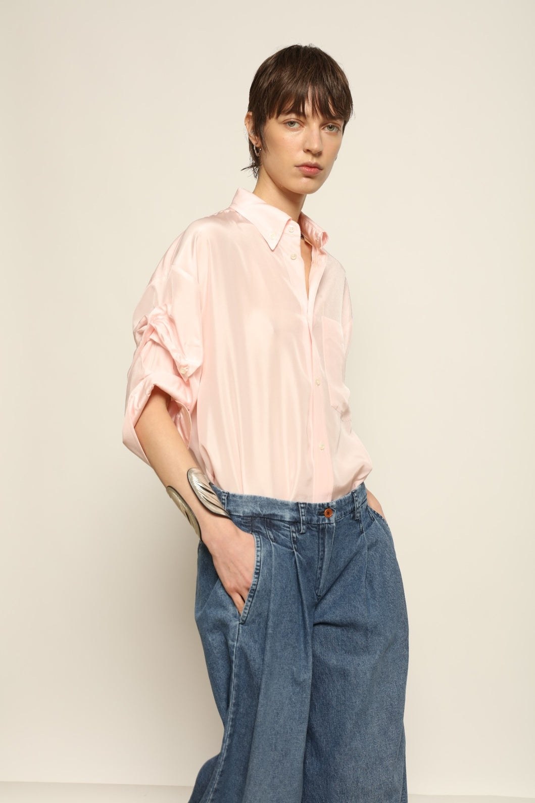 Buba Shirt by Maison Jejia in fluid silk, featuring a softly draped silhouette, delicate ruffle detailing at the sleeves and a light, airy finish, available in Pink and Vanilla and made in Italy.