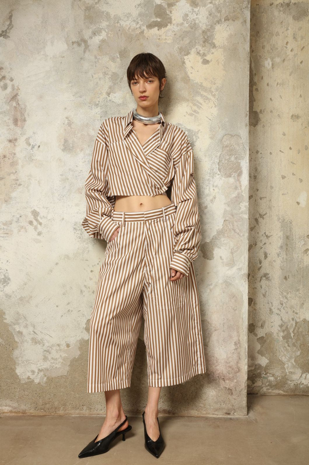 Carla Rust Striped Cotton Bermuda by Maison Jejia, crafted in soft cotton with warm rust and white stripes, a structured waistband, oversized patch pockets and a relaxed knee-length silhouette.