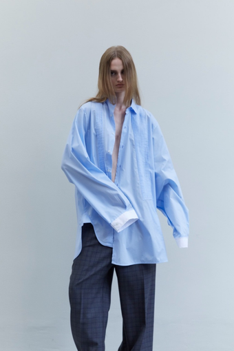 Crazy Smoking Sky Blue Plissé Shirt by Maison Jejia, front view showing the oversized silhouette, soft cotton fabric and delicate plissé texture.