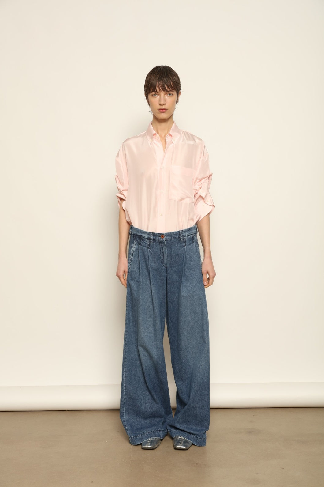 Buba Shirt by Maison Jejia in fluid silk, featuring a softly draped silhouette, delicate ruffle detailing at the sleeves and a light, airy finish, available in Pink and Vanilla and made in Italy.