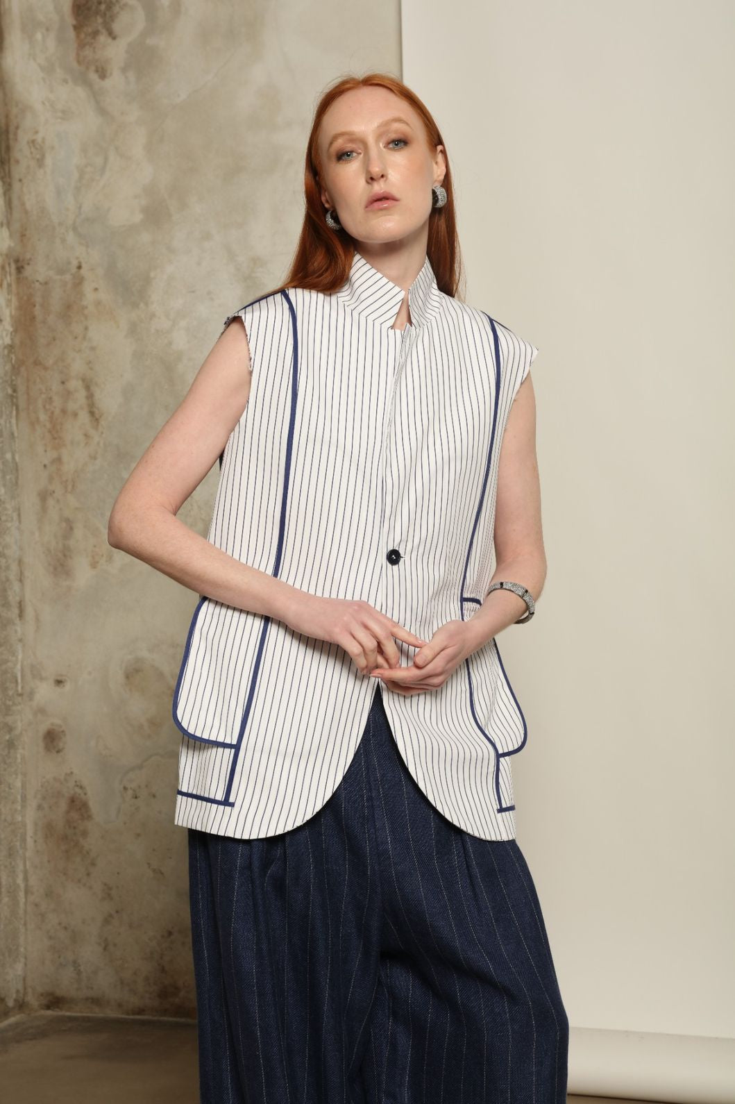 Harry Gilet by Maison Jejia showing the refined blue stripe pattern, clean lines and lightweight cotton construction.