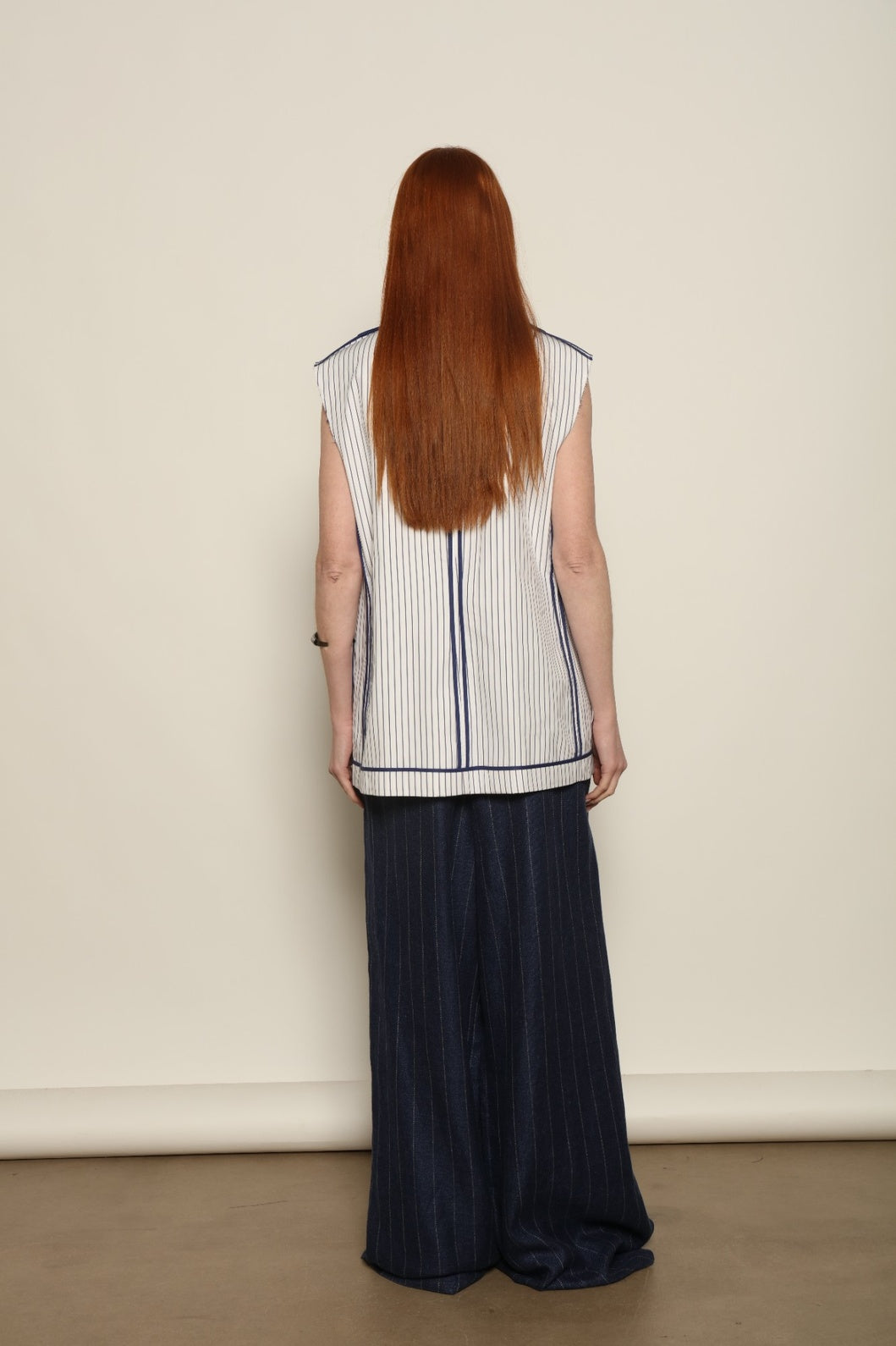 Harry Gilet by Maison Jejia balancing relaxed proportions with precise tailoring in white and blue striped cotton.
