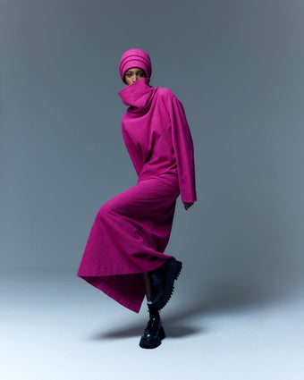 Cowl Neck Berry Bouclé Dress by Marrakshi Life, made in Marrakesh from soft cotton bouclé with a rich berry tone, sculptural cowl neckline, long sleeves and a relaxed flowing silhouette.