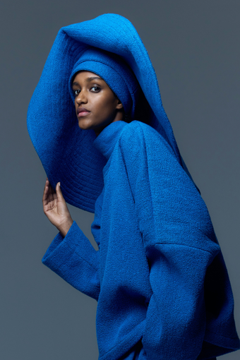 French Blue Bouclé Pamela Hat by Marrakshi Life, crafted in Marrakesh with a wide sculptural brim, soft textured bouclé finish and floral-inspired appliqué detail.