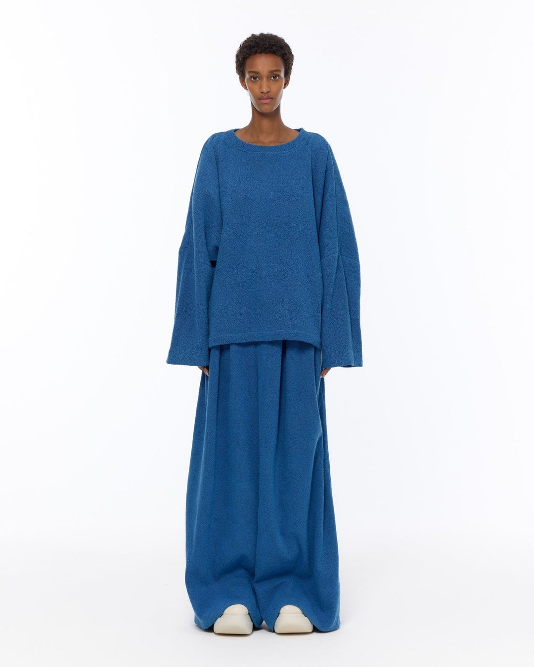 Marrakshi Life French Blue Bouclé Sweater featuring dropped shoulders and an easy, relaxed silhouette.