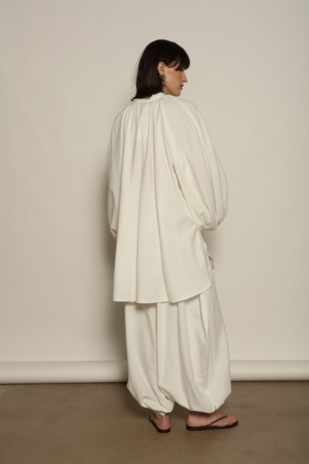 Harem Pant by Marrakshi Life in soft handwoven cotton, featuring a voluminous drape, gently tapered silhouette, elasticated waist and cuffed ankles.
