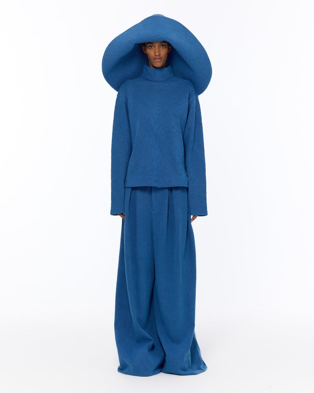 Mid Rise French Blue Bouclé Pant by Marrakshi Life, handcrafted in Marrakesh with a soft textured bouclé finish, mid-rise waist and fluid wide-leg silhouette.